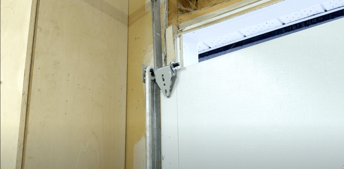 inserting bottom panel into vertical tracks