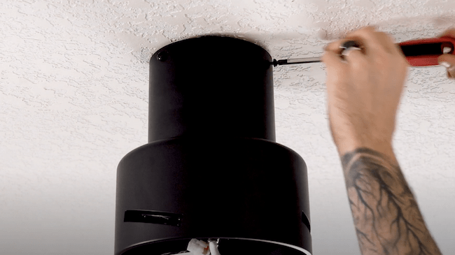 screwing motor canopy to ceiling mount